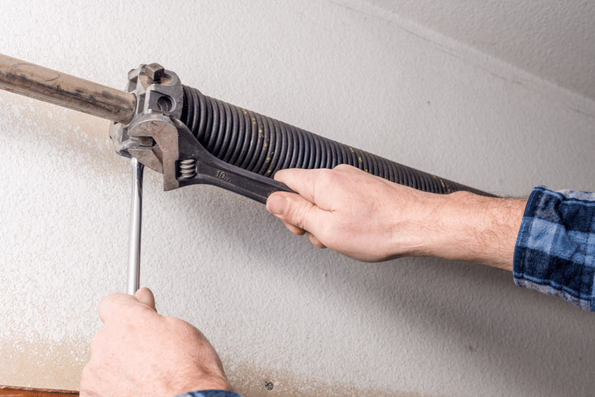 Broken garage door spring requiring service